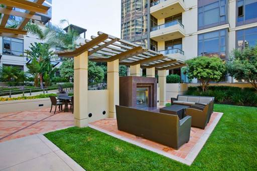 A picture containing grass, outdoor, building, sidewalk

Description automatically generated